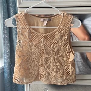 Tan tank top with cutouts